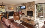 Living room with gas fireplace and flat screen television